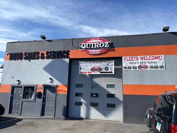 Quiroz Auto Center shop exterior with service bay